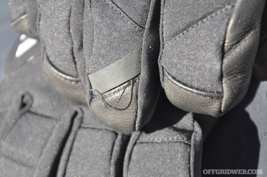 Close-up of stitching defect in gloves.