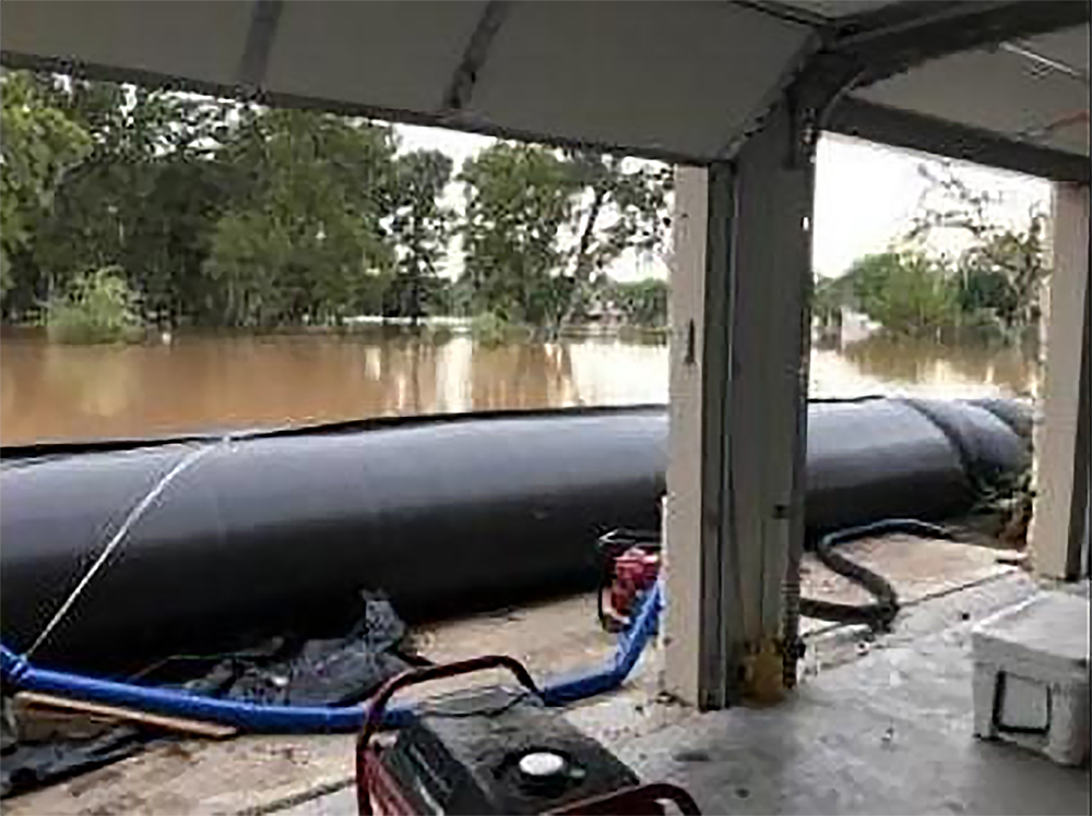 Aqua Dam flood water storm hurricane protection preparation 7