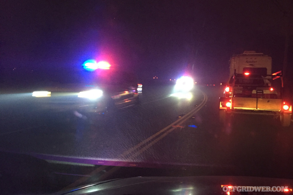 11:04 AM - Police cars headed into town.