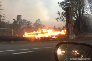 12:45 PM - The burning remains of the 