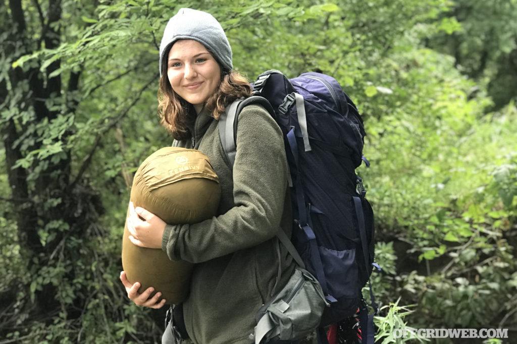 woman with a bug out bag