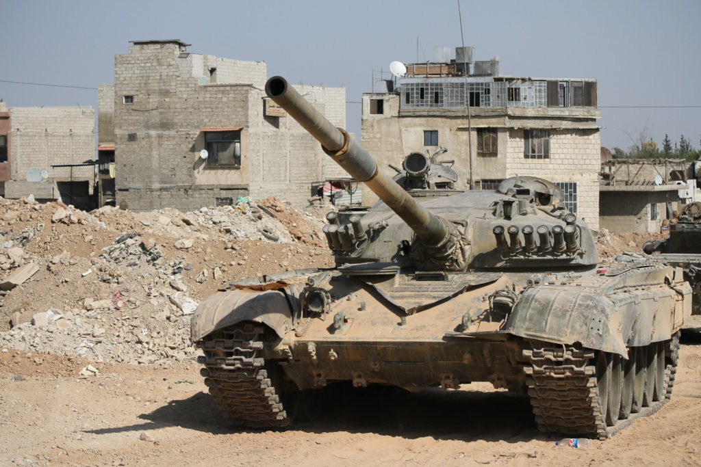 Tank Syrian national army near the combat zone in Damascus