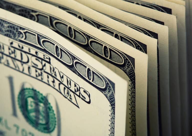 Closeup of $100 dollar bills in a row