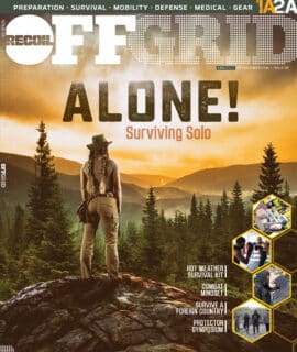 Front cover of Recoil Offgrid, Issue 55. Depicts a lone person standing on a rocky outcrop, gazing across the wilderness.