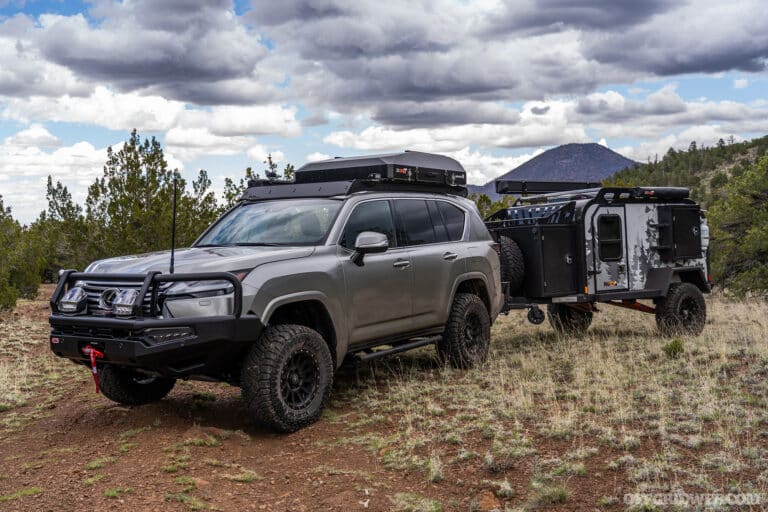 Front side profile photo of a 2022 Lexus LX600 modified to be the Ultimate Overland Vehicle at the 2023 Overland Expo.