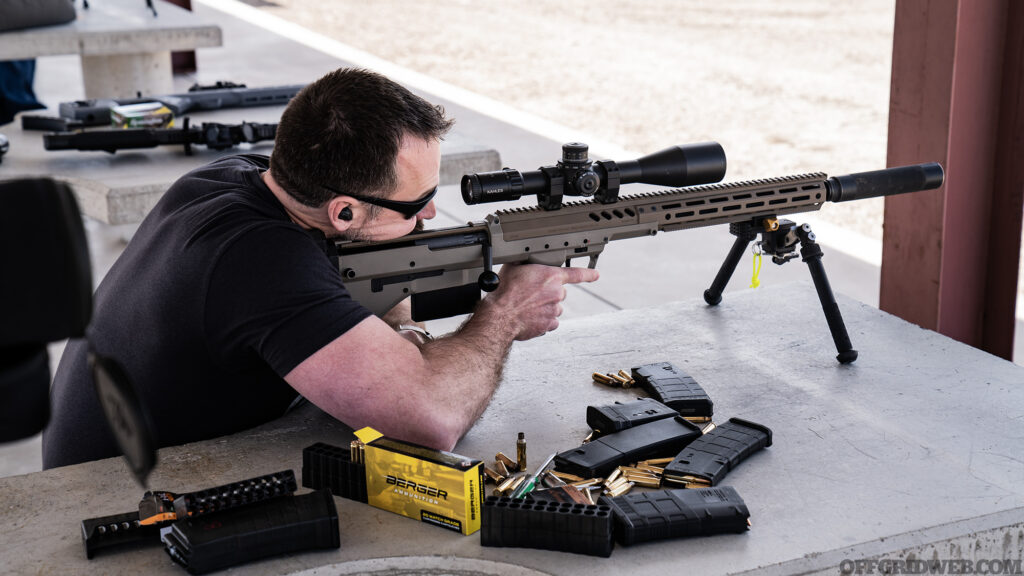 Photo of Patrick Diedrich firing a Desert Tech rifle.