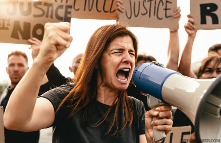 Photo of a an angry mob during a modern day witch hunt.