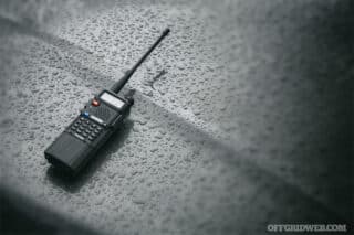 Photo of a Baofeng radio on the sidewalk.