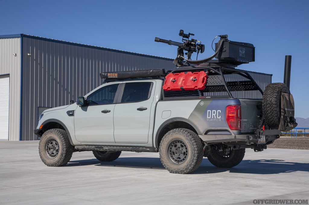 Side profile of a ford ranger mounted with a Dillon Aero minigun as viewed from the rear.