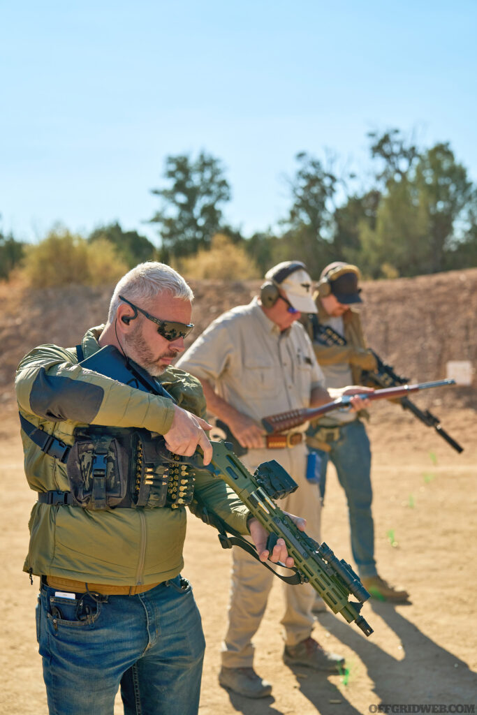 Photo of students reloading at a gun course.