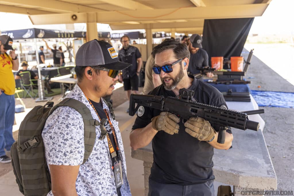 A CANCON vendor discussing their products with a participant.