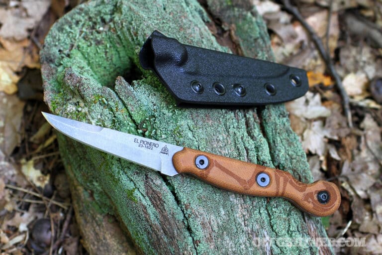 The TOPS Knives El Pionero in the on a mossy log