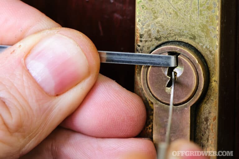 image of a lock pick set picking a lock