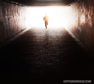 SERE man running through a tunnel