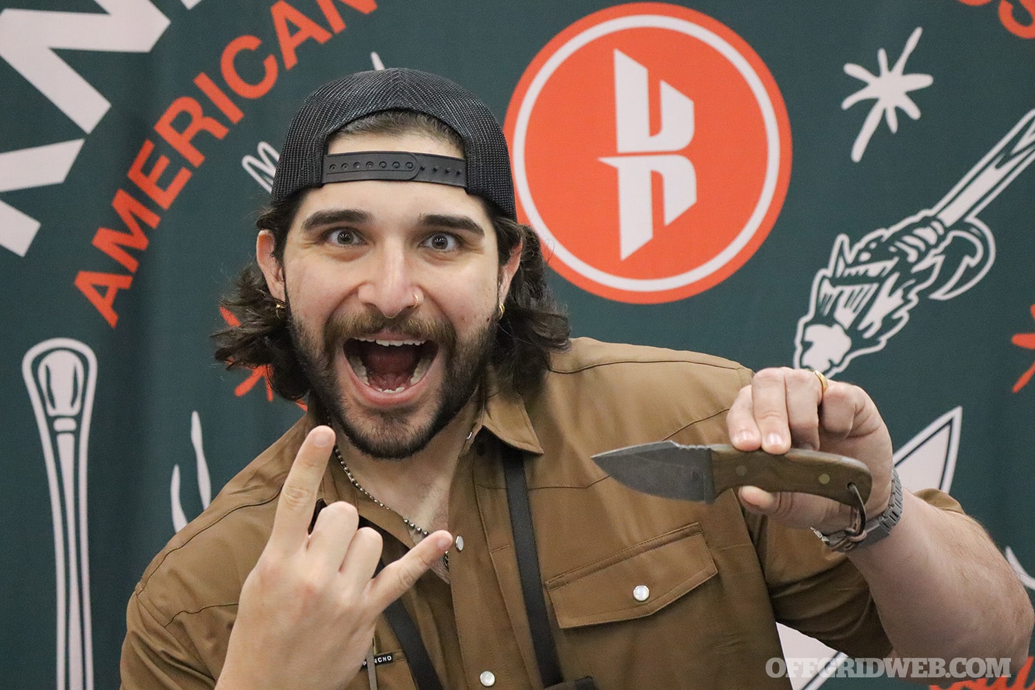 rikki hernandez with his knives by nuge collab at blade show