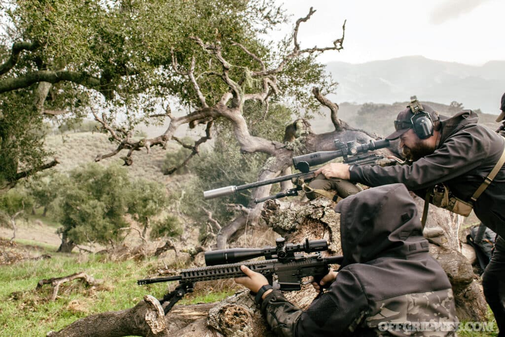 students in long range shooting class with different rifles