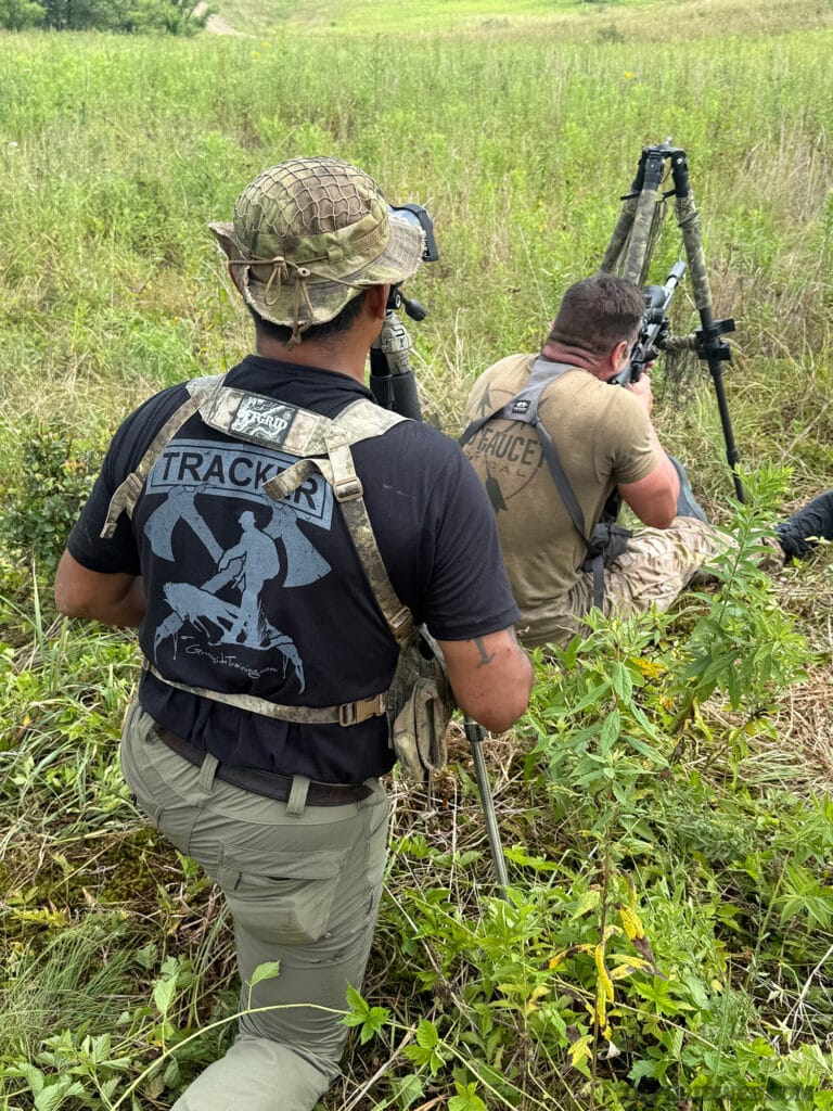 instructor and undisclosed participant at long range shoot