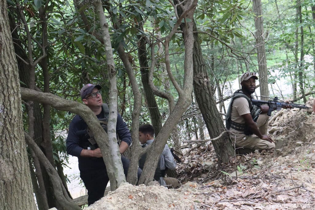 UNDISCLOSED PARTICIPANTS IN THE WOODS