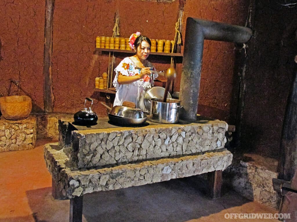 A woman at a Mexican chocolate farm shows how to make a fresh drink from the seeds of cacao.