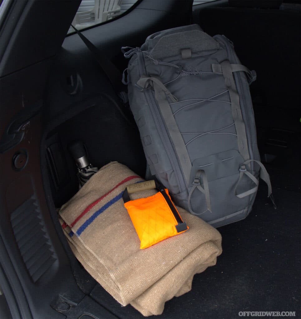 Keeping a winter survival kit with extra dry clothing, blankets, and a fire kit can help keep you warm in the event of a vehicle breakdown. A reliable get-home bag like this Vanquest Ibex will allow you to transport all your warming essentials on foot should you need to abandon your vehicle.