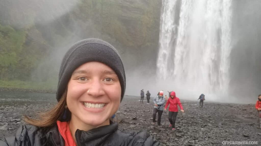 Jacks Genega in iceland in front of waterfall