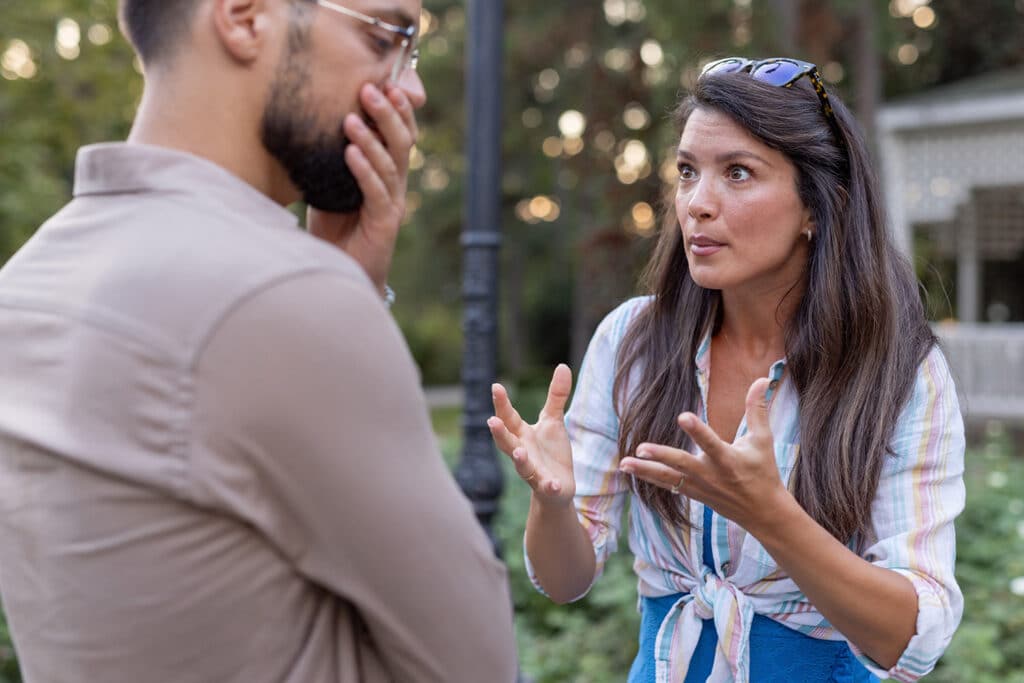 a man and woman in verbal conflict