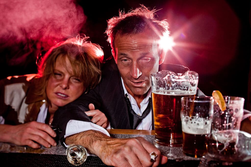a drunk man and woman