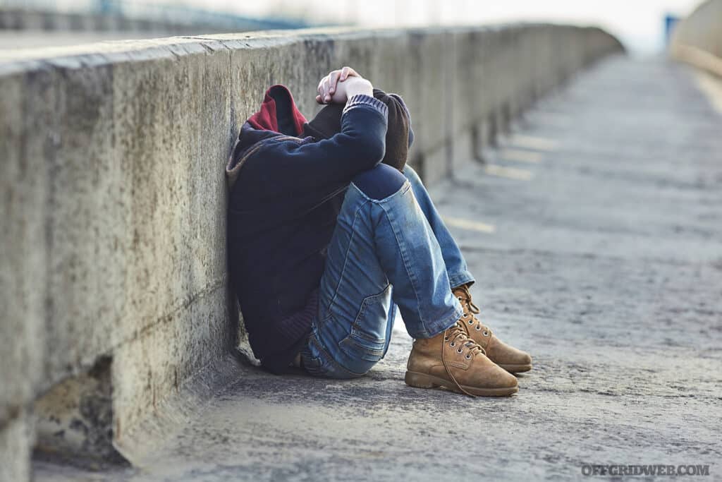 man on street in crisis