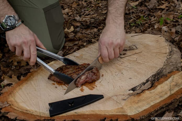 Benchmade Wildcoast Maple Valley cuttin steak at camp