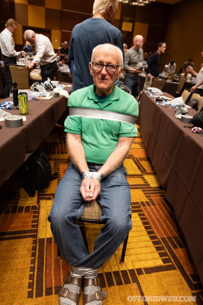 older man bound by duct tape