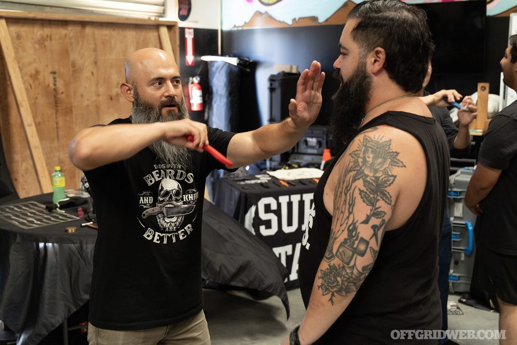 Two industry partners training in Libre Knife Fighting.